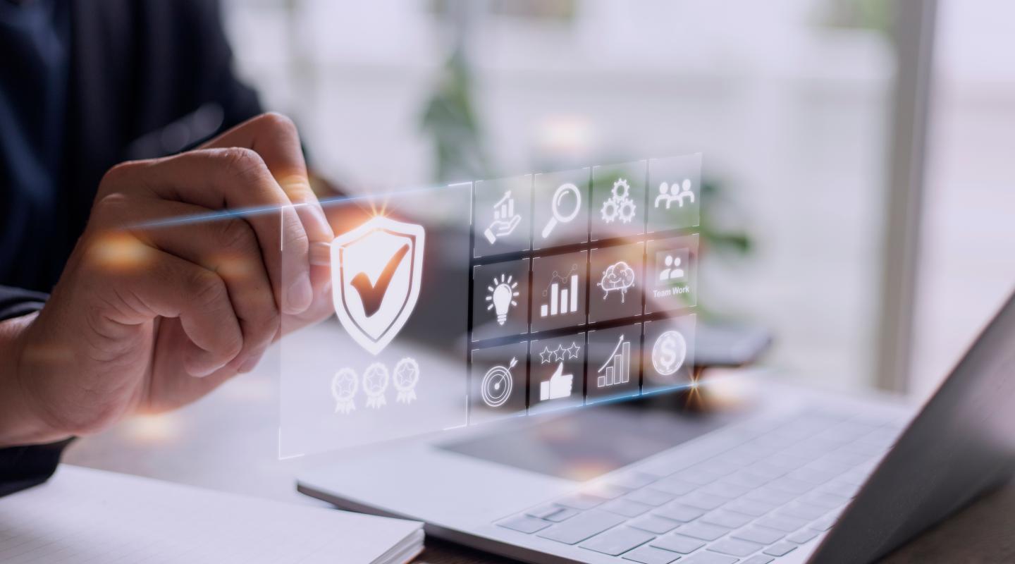 Man holding pen to checkmark graphic indicating Standards