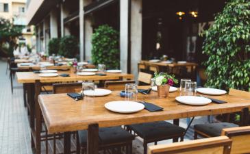CL-Hospitality.jpeg Outdoor restaurant patio with dining tables