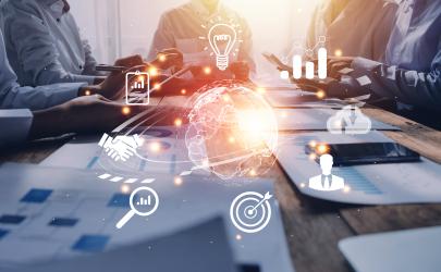 Icons depicting data exchange, ideas, innovation. Business professionals gathered in a meeting.